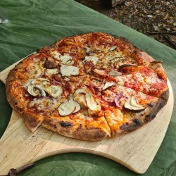 Homemade mushroom pizza using mushrooms collected on Forage London wild food walk